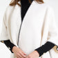 Paula Stitch Hem Tassel Cape Cream