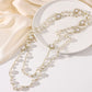 Cream pearlies necklace with gold filigree accents